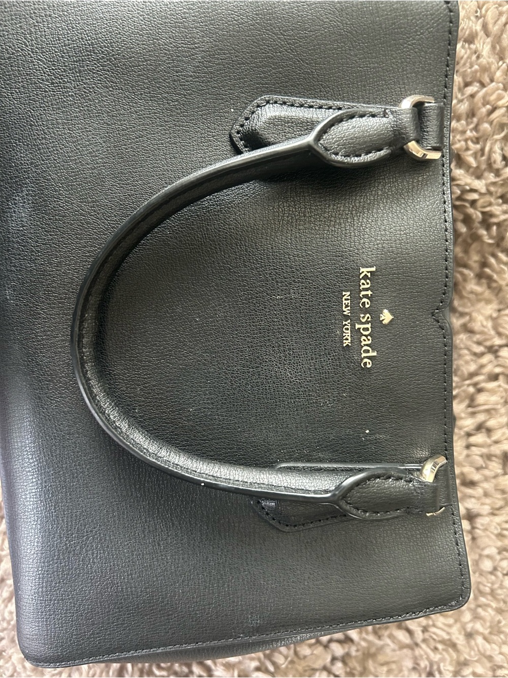 kate spade black leather satchel with gold logo